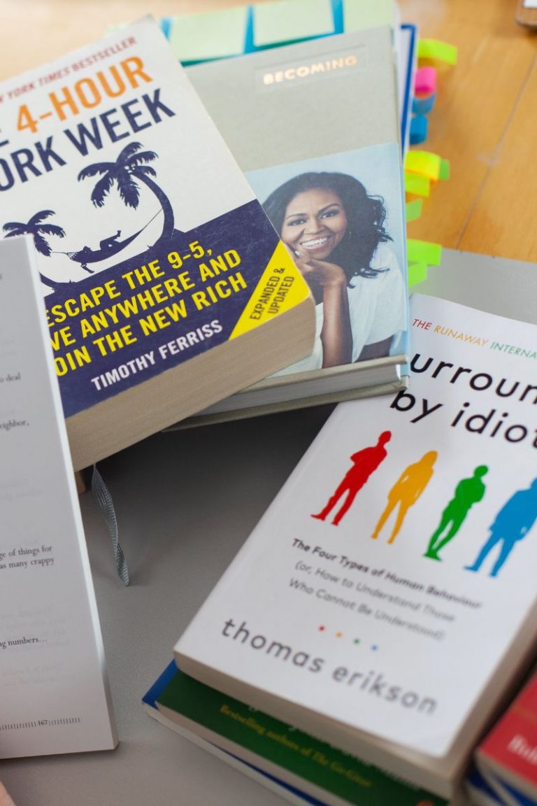 Selection of books including Michelle Obama - Becoming Journal, Thomas Erikson - Surrounded by Idiots and Timothy Ferriss - The 4 hour work week
